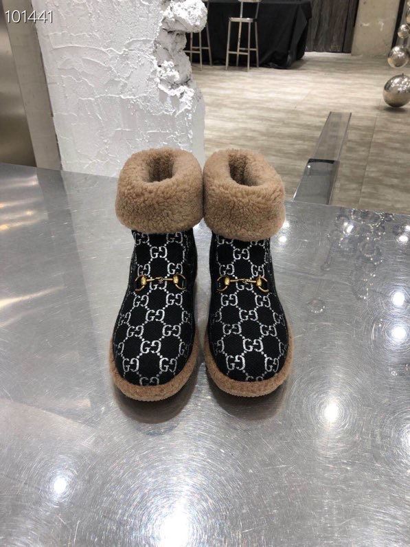 G*u*i boots